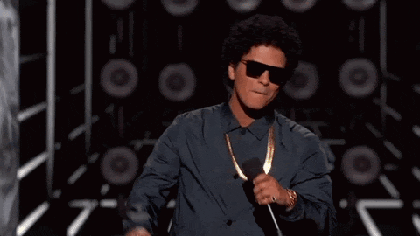 A performer gesturing that there's more